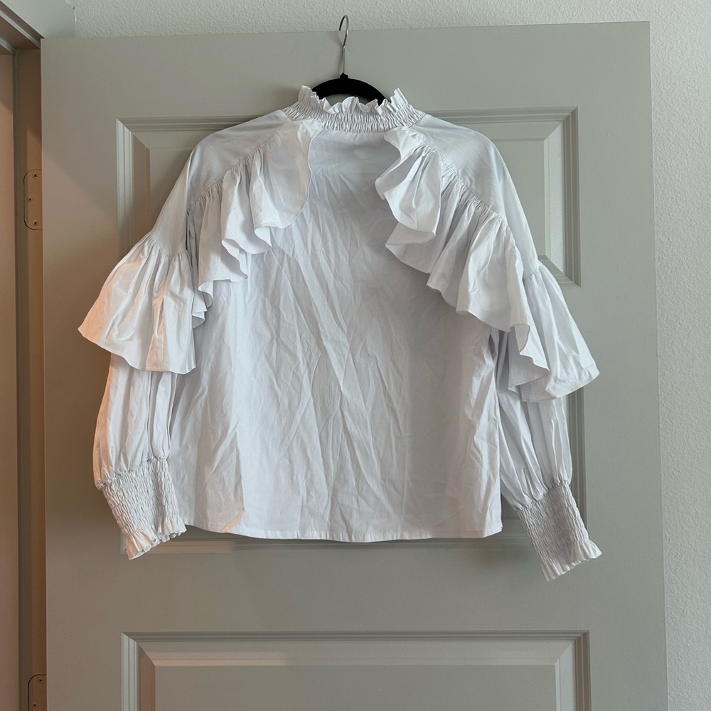 Giovanna Maroso white blouse